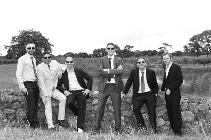 groomsmen in field
